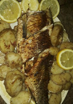 صورة لوصفة سمك مع البطاطا بالفرن