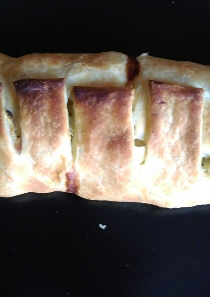Una foto de Empanada de hojaldre con verduras y queso