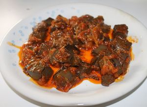 Una foto de Sangre encebollada con tomate