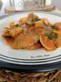 Gallo en salsa con almejas