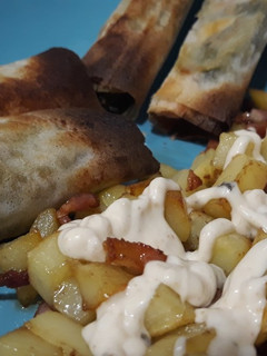 Una foto de Rollitos de Pasta Brick Rellenos de Espinacas Jamón y Queso