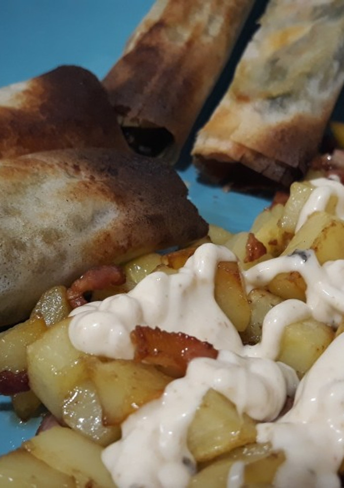 Una foto de Rollitos de Pasta Brick Rellenos de Espinacas Jamón y Queso