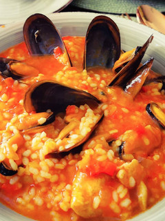 Una foto de 🍅Arroz caldoso con mejillones🍅