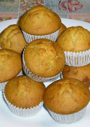 Foto principal de Magdalenas caseras rellenas de chocolate y coco rallado