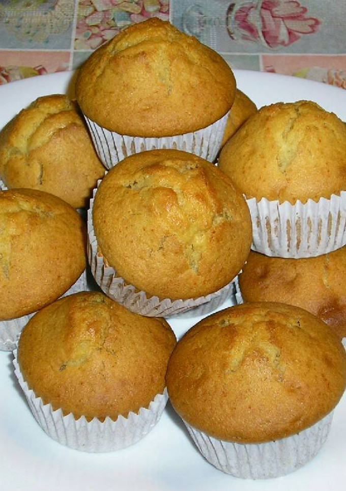 Una foto de Magdalenas caseras rellenas de chocolate y coco rallado