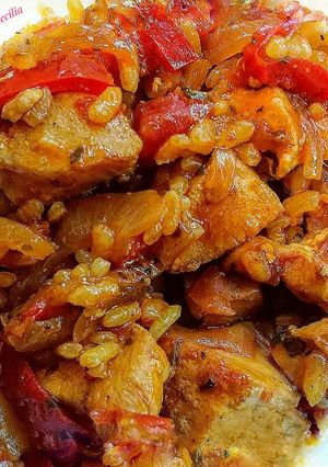 Una foto de Arroz con pollo y especias
