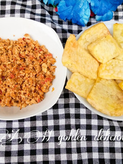 A picture of Fried yam with scrambled egg sauce.