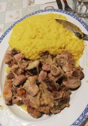A picture of Ossobuco with Risotto alla Milanese.