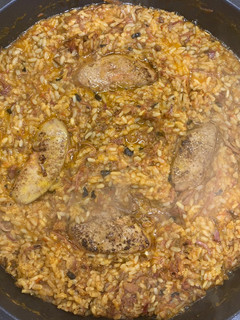 Una foto de Arroz con pato foie y setas