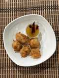 Pollo rebozado en salsa de piña