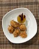 Pollo rebozado en salsa de piña
