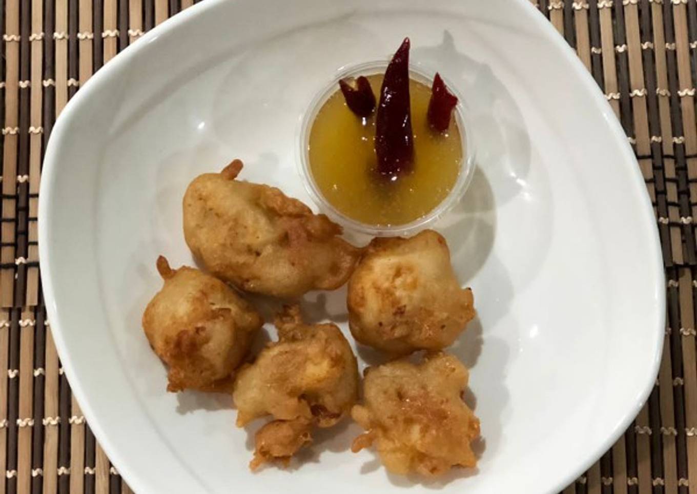 Pollo rebozado en salsa de piña