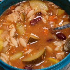 A picture of *Tomato Chicken Zucchini Orzo Soup.
