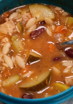 A picture of *Tomato Chicken Zucchini Orzo Soup.