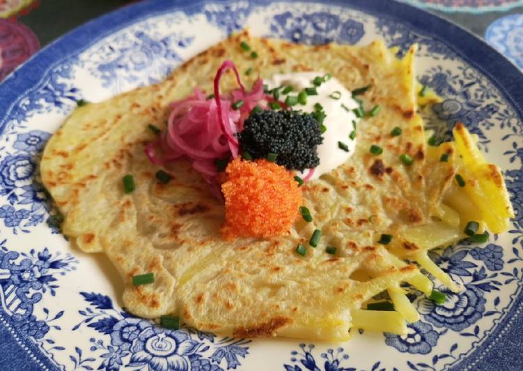 Caviar on potatoes pancakes