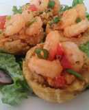 Tostones rellenos con  enchilado de mariscos