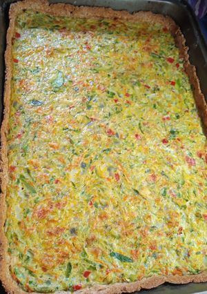 Una foto de Tarta de zapallitos y zucchini🧅🥕🎉🧅🥕🎉🧅🥕🎉💕❣️💕❣️💕