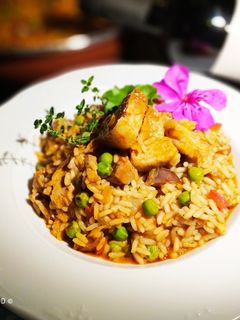 Una foto de Arroz con Costillas al Vino Tinto