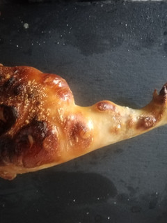 Una foto de Cochinillo asado