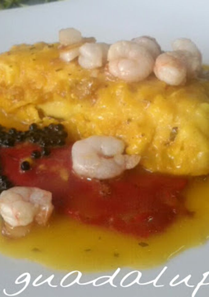 Una foto de Merluza en salsa con piquillos y gambas picantes en GME Y GMF y tradicional