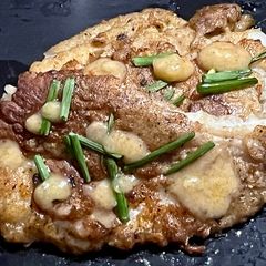 A picture of Cream Dory fish with Tangy gravy sauce.