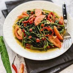 A picture of Tumis Kangkung Pedas (Spicy Water Spinach Stir Fry).