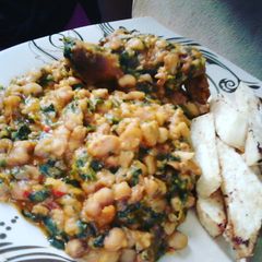 A picture of Grilled Chicken, Ugu Vegetable Honey Beans and Fried Yam Fingers.