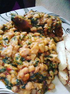 A picture of Grilled Chicken, Ugu Vegetable Honey Beans and Fried Yam Fingers.
