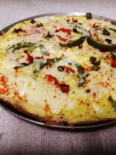 অমলেট পিৎজা(Omlette pizza recipe in bengali) রেসিপির প্রধান ছবি