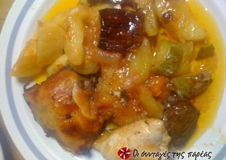 Chicken in wine with eggplants in the oven