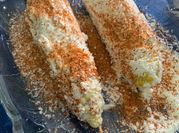 Una foto de elotes en vaso