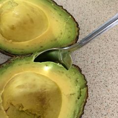 A picture of #HowTo open an Avocado!.