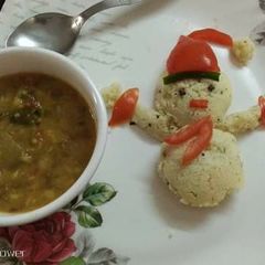 A picture of Snowman Semolina(rava) idli and less spiced vegetable sambhar.