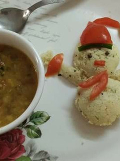 A picture of Snowman Semolina(rava) idli and less spiced vegetable sambhar.