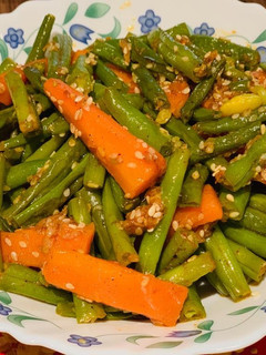 A picture of Beans and carrots stir fry.