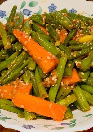 A picture of Beans and carrots stir fry.