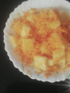 A picture of Pineapple and carrots salad.