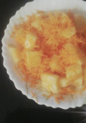 A picture of Pineapple and carrots salad.