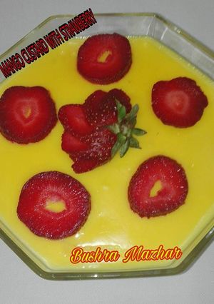A picture of Mango Custard With Strawberry 🍓🍓.