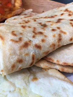 A picture of Manoushe (منقوشه) - Lebanese Flatbread with Toppings.