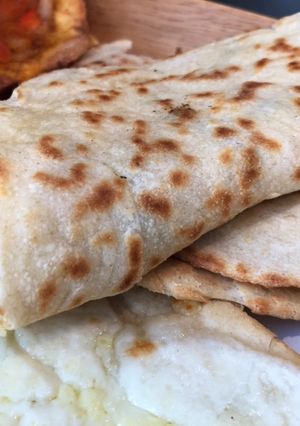 A picture of Manoushe (منقوشه) - Lebanese Flatbread with Toppings.