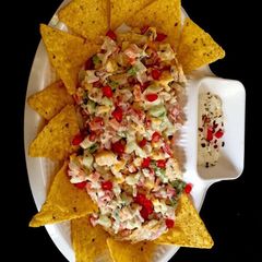 A picture of Nachos creamy deliteA very healthy and Yummylicious snacks with homemade nachos with diff veggies.