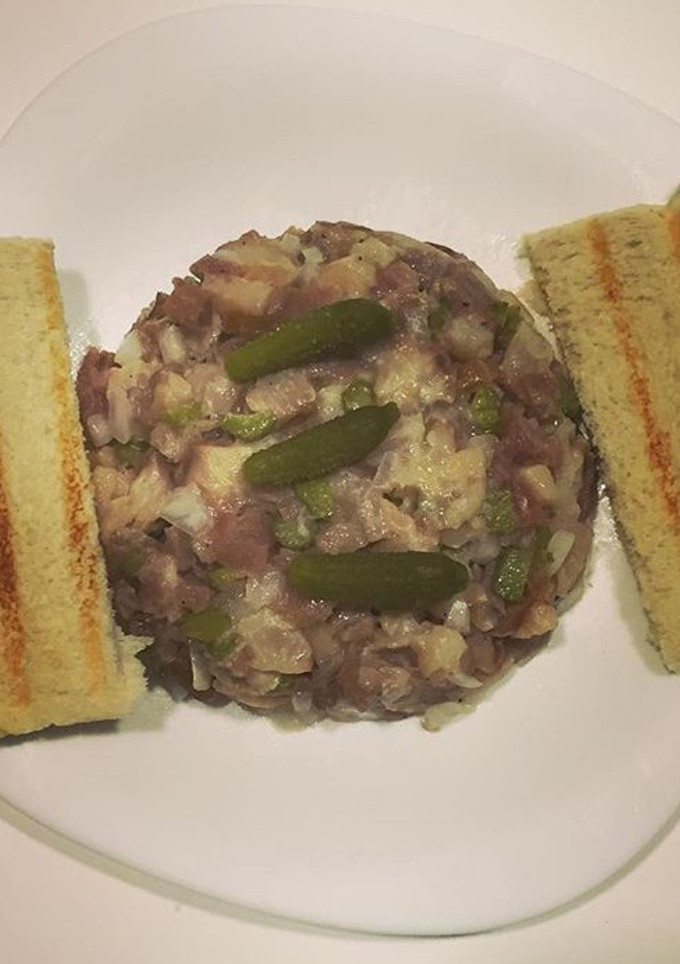 Una foto de Tartar de salmón y atún ahumado