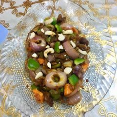 A picture of Beef Chili with nuts.