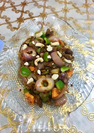 A picture of Beef Chili with nuts.