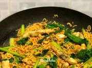 A picture of ốc móng tay xào mì