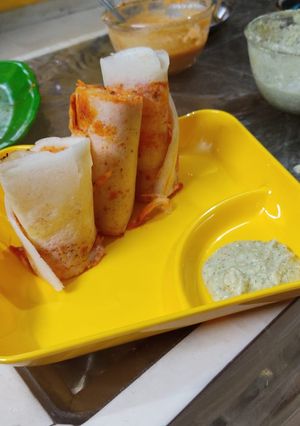 A picture of Schezwan Paneer Dosa rolls.