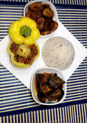 A picture of Ofada rice with snail sauce.