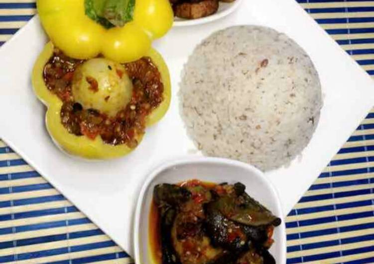 Ofada rice with snail sauce