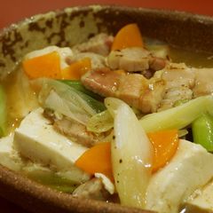 A picture of Bacon and Tofu stir-fry in Japanese Style gravy.